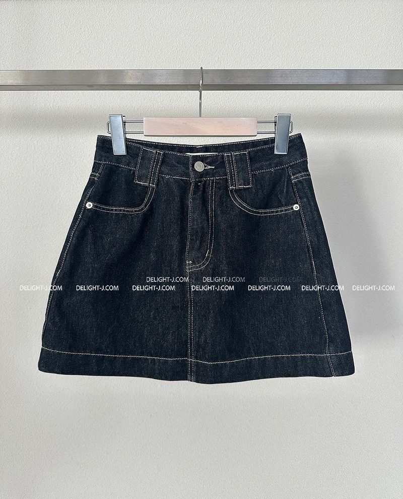 a raw paper stitch jean skirt