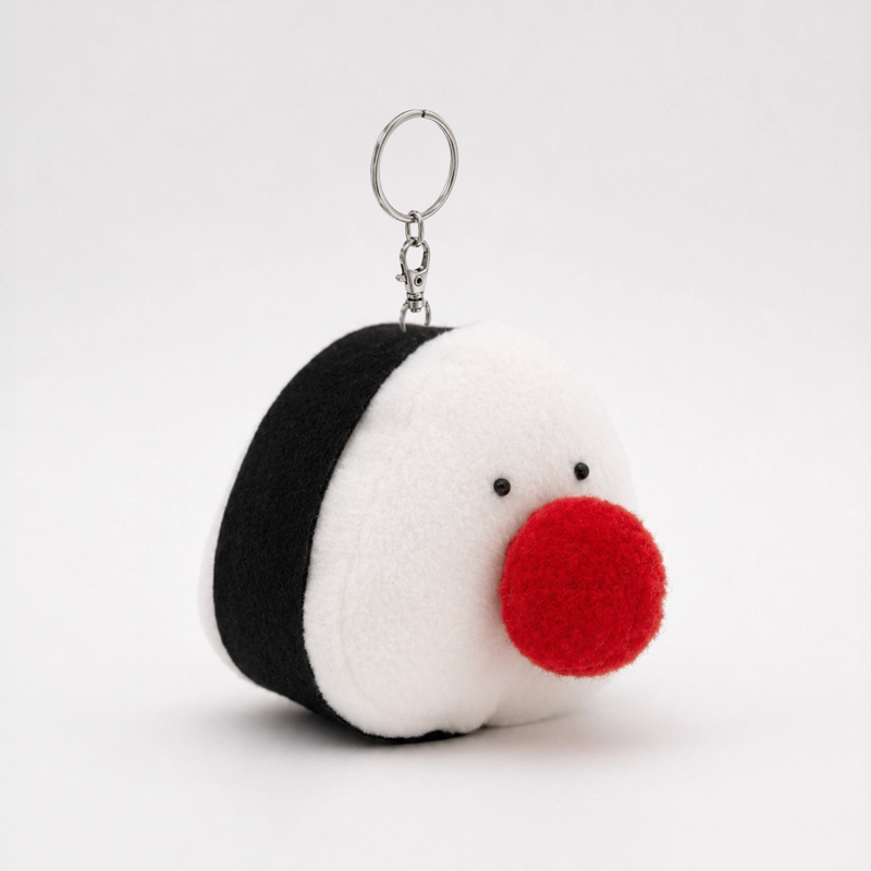 cumo(クモ)の「【MADE】梅干しおにぎりカモ (keyring)(トイ/キーホルダー)」