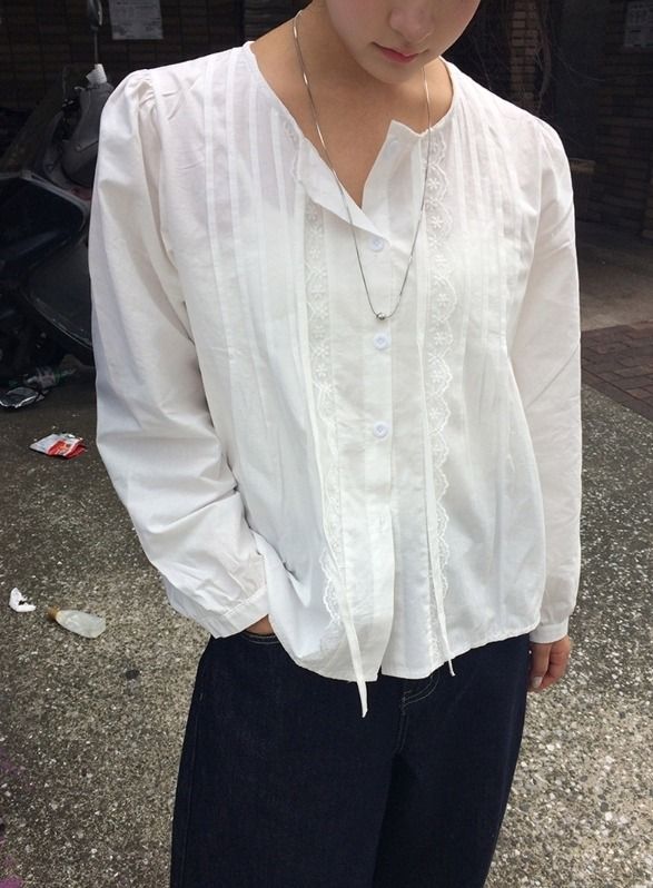 anyonemore（エニーワンモアー）の「Niro Pintuck Strap Long Sleeve Blouse（Tops）」