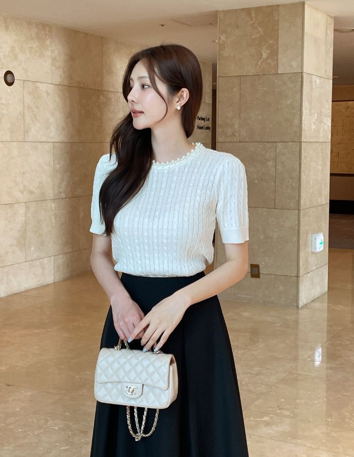 iam mari（アイアム マリ）の「Shuena Pearl Neck Cable Short Sleeve Knit（Tops）」