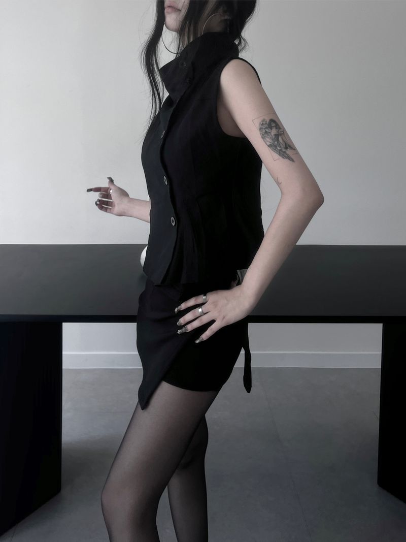 high-neck black button vest