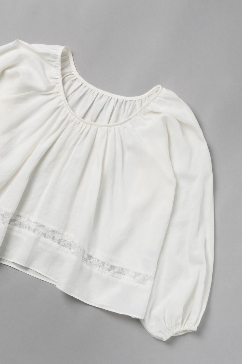 Pale lace blouse