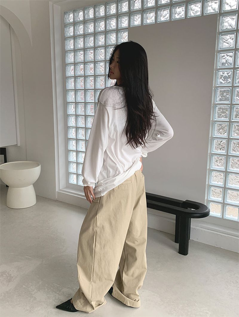 CURVED TUCK COTTON TROUSER