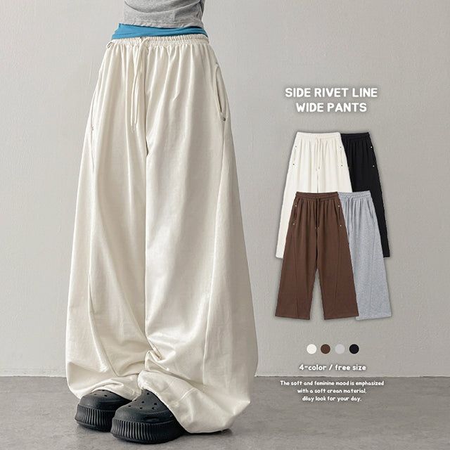 hijjoo(ハイチュー)の「One-mile wear✨ Rivet curved cotton wide pants (4 colors)(Pants)」