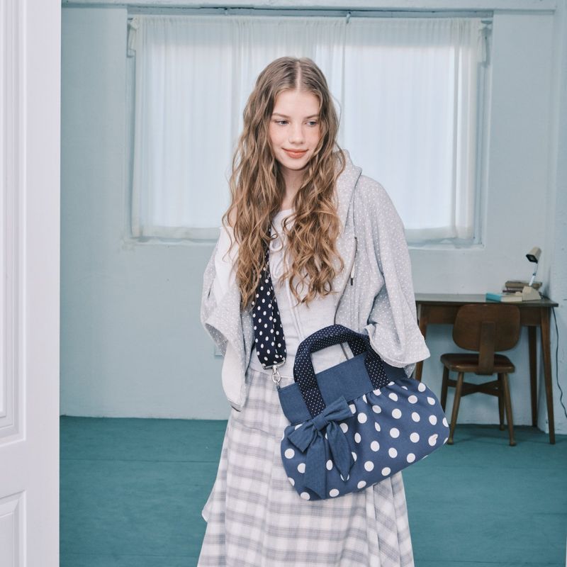 cozing(コジング)の「Ribbon dumpling bag_navy(Bags)」