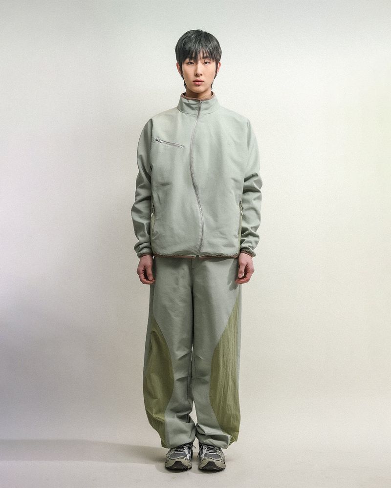 towtow.archive（トゥトゥ アーカイブ）の「ASYMMETRIC WAVE PANTS-EARTHY GREEN（Pants）」