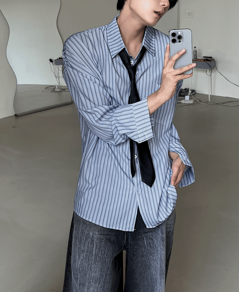 COSYHARU(コシハル)の「loose-fit striped shirt(Tops)」