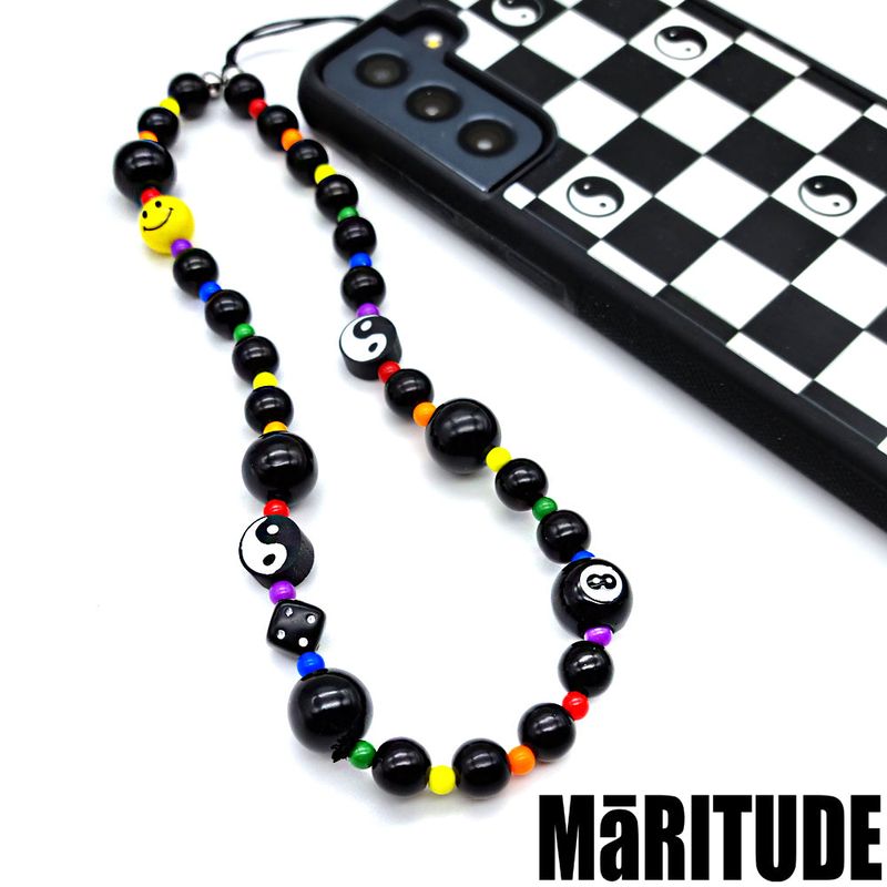 MaRITUDE（マリチュード）の「インヤンスマイルフォーンストラップ（ファッション小物）」