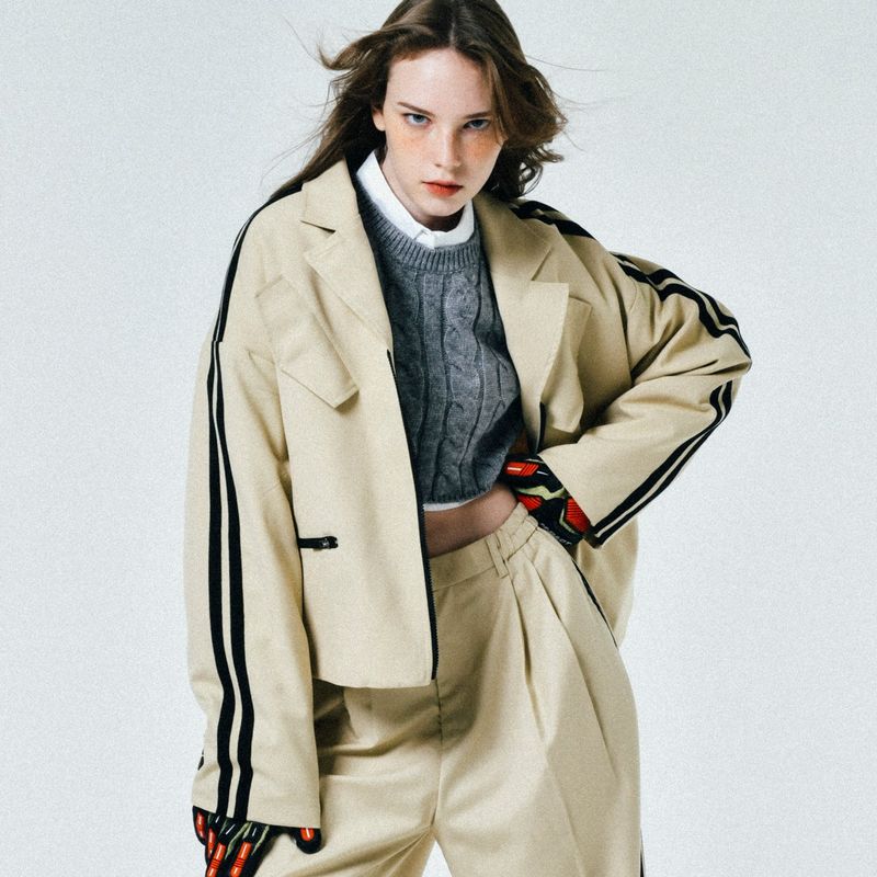 C.O.M.E（シーオーエムイー）の「[UNISEX] Satin-Trimmed Padded Racing Jacket (Beige)（Jackets/Outerwear）」