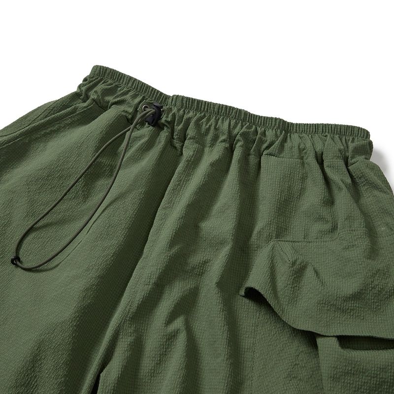 Packable parachute cargo pants / Evergreen