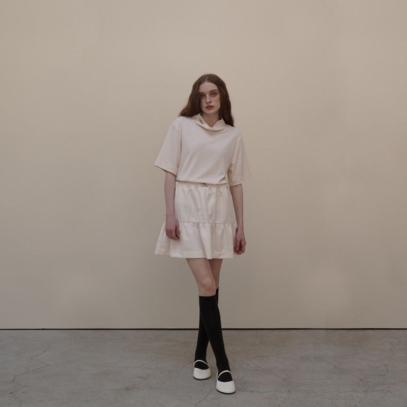 Cream Cancan Mini Skirts