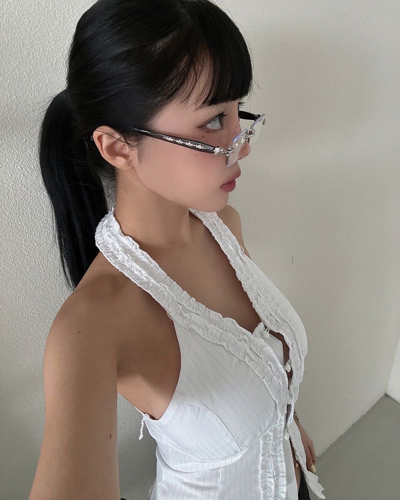 chrome cross-rimmed glasses