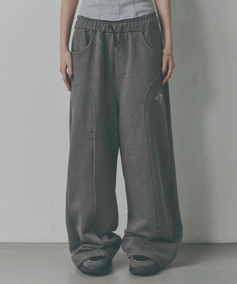 UPDRAFT（アップドラフト）の「カットアウト ライン リベット ウォッシュド トラックパンツ [Cool Grey]（パンツ）」