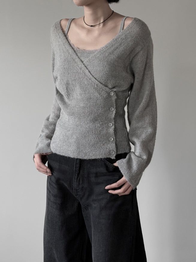 mnem（ムネム）の「Colin V-neck Wrap Button Wool Knit（Tops）」
