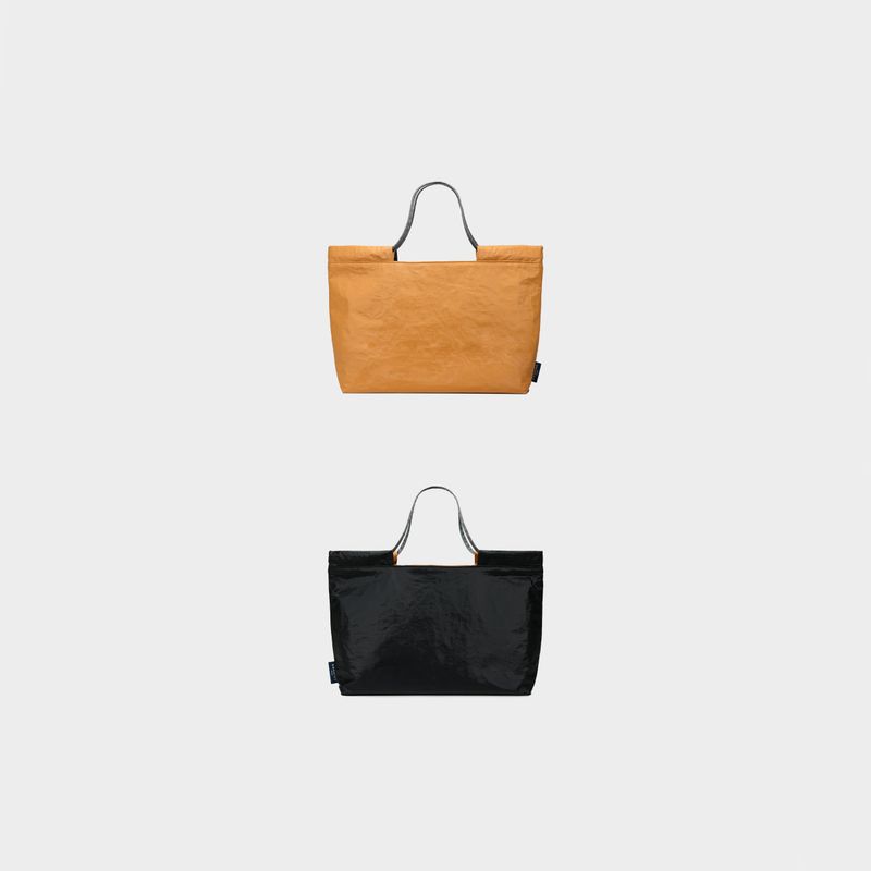BASKISS（バスキス）の「TYVEK FLEXIBLE BAG - Golden Yellow & Black (SMALL)（Bags）」