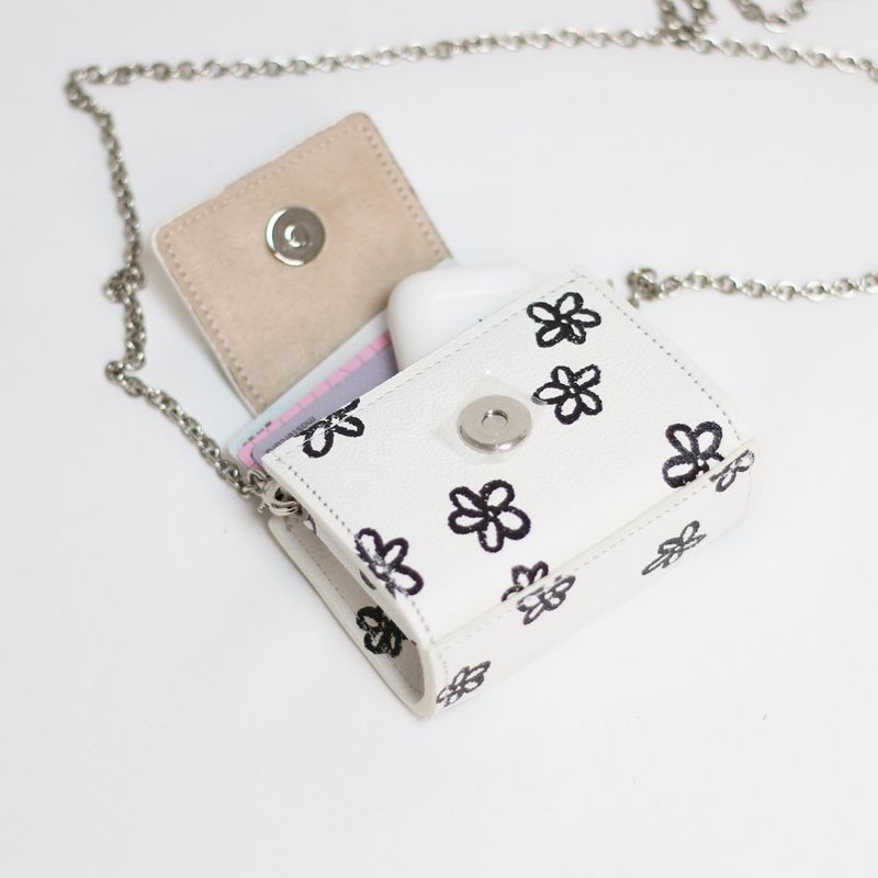 shape of' microbag - black flowers