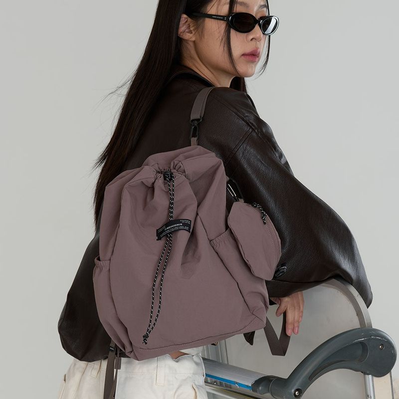 NEIKIDNIS（ネイキドニス）の「IDパッカブルストリングバックパック 14L / Mud（バッグ）」