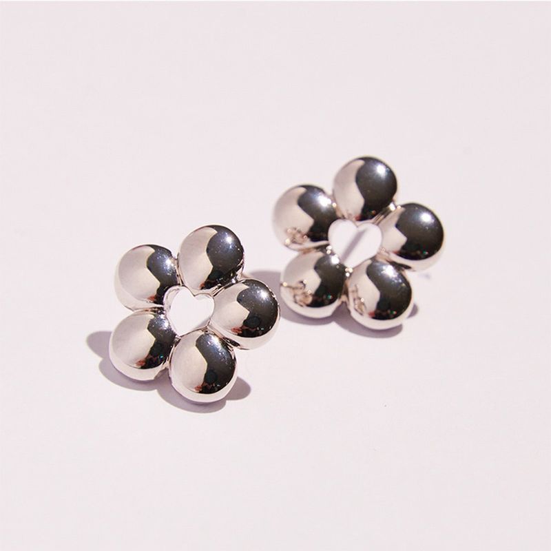 HEART PUNCHING EARRINGS
