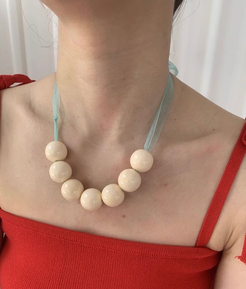 Yellow ball@mint tie necklace