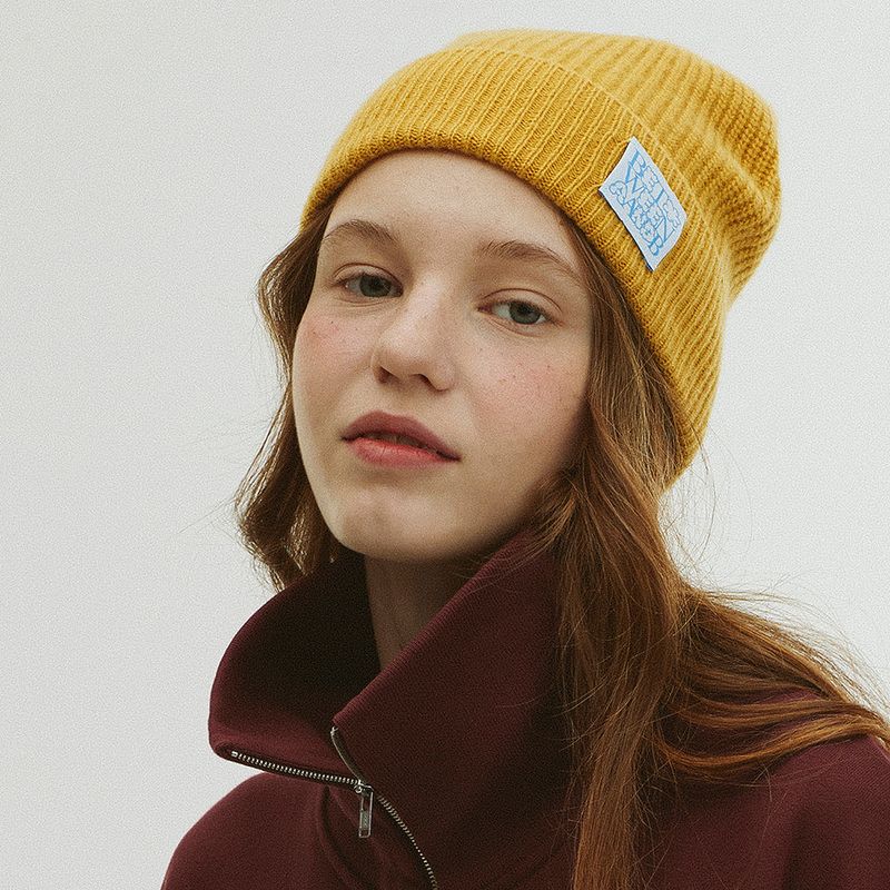 Between A and B(ビットウィーンエーアンドビー)の「BUBBLE LABEL CASHMERE WOOL BLENDED BEANIE_MUSTARD(Hats)」