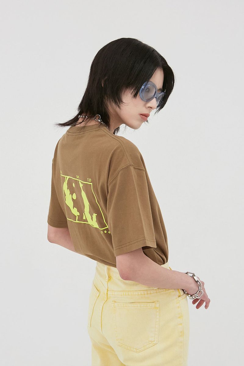 APIECEOFCAKE（ピースオブケイク）の「Square Graphic Tee_Brown（Tops）」