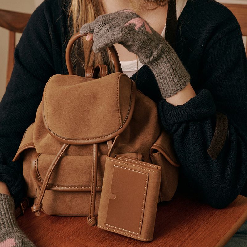 ALLINCOMPLETE（オールインコンプリート）の「Nube Suede Mini Backpack (Camel)（Bags）」