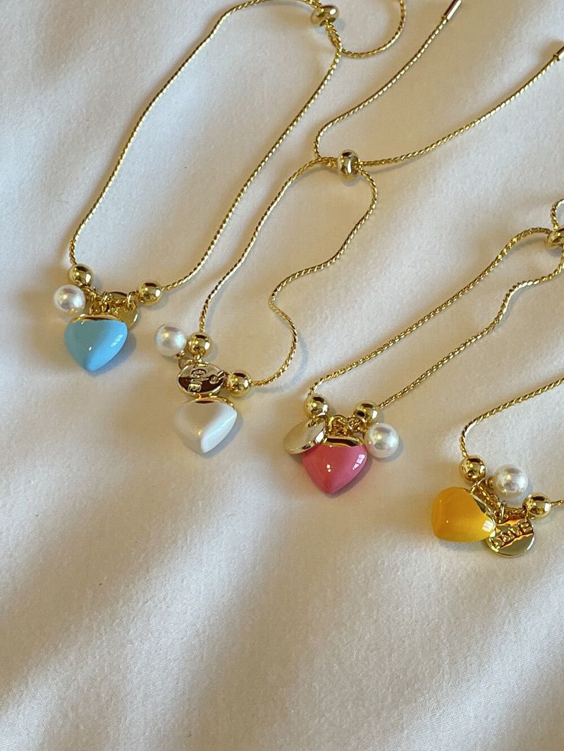 MÜCE（ミュセ）の「0030 Colored heart pendant gold bracelet（Accessories）」