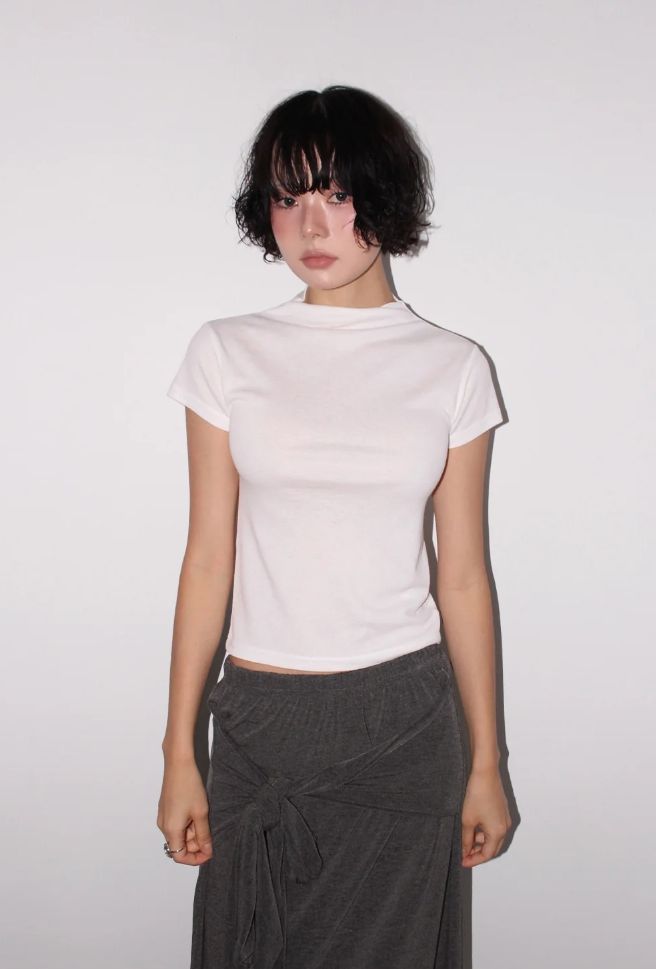 AAKE(アケ)の「キャップスリーブモックネックニット(トップス)」