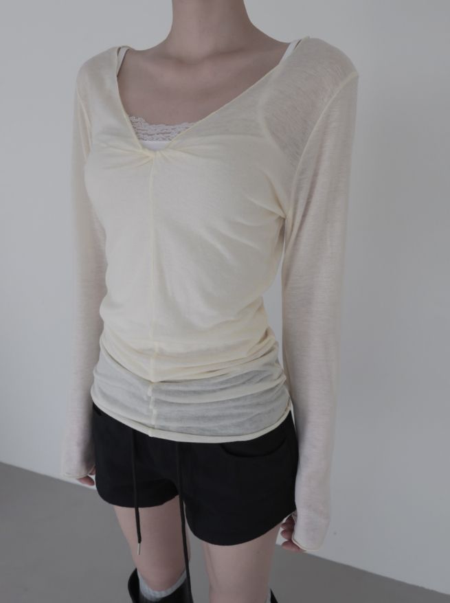 mnem（ムネム）の「ヌエル ツイステッド ロングスリーブ Tシャツ（トップス）」