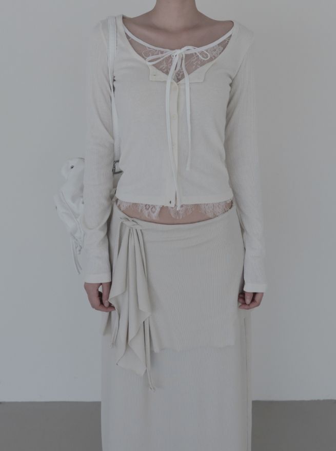mnem（ムネム）の「Hav Lace Layered Cardigan（Tops）」