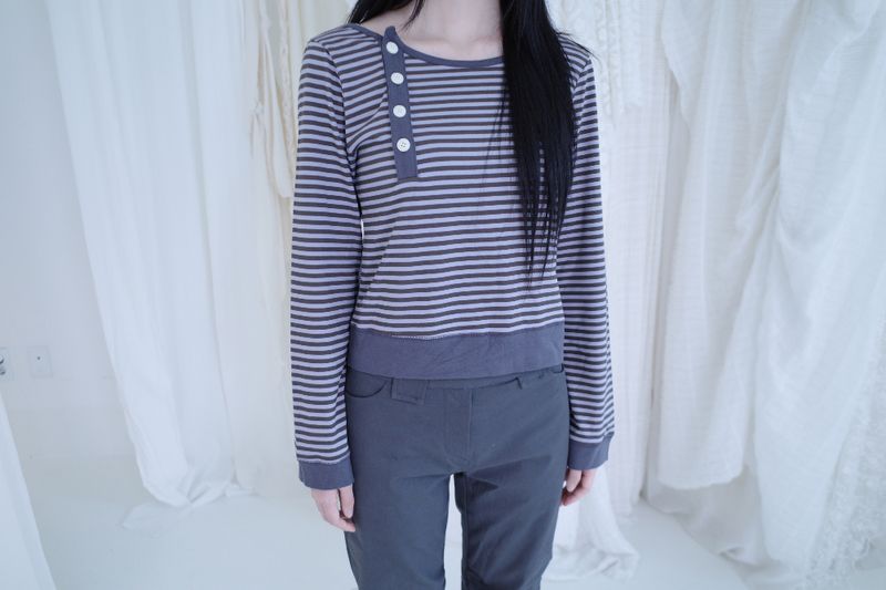 myorang（ミョラン）の「ダブルダンガラボタンTシャツ（3color）（トップス）」