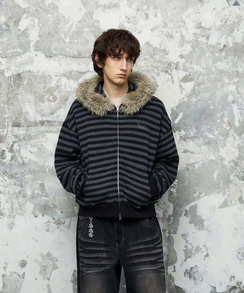 mahagrid（マハグリッド）の「ストライプ ファー フード ジップアップ ブラック（トップス）」