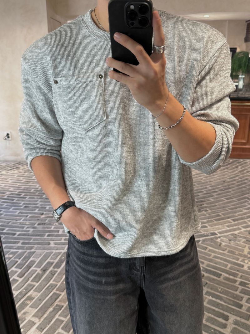 AVAND（アバンド）の「リベット クロップ ニット ロングスリーブ Tシャツ（トップス）」